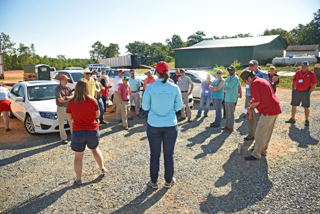 Agent speaking to crowd during field day